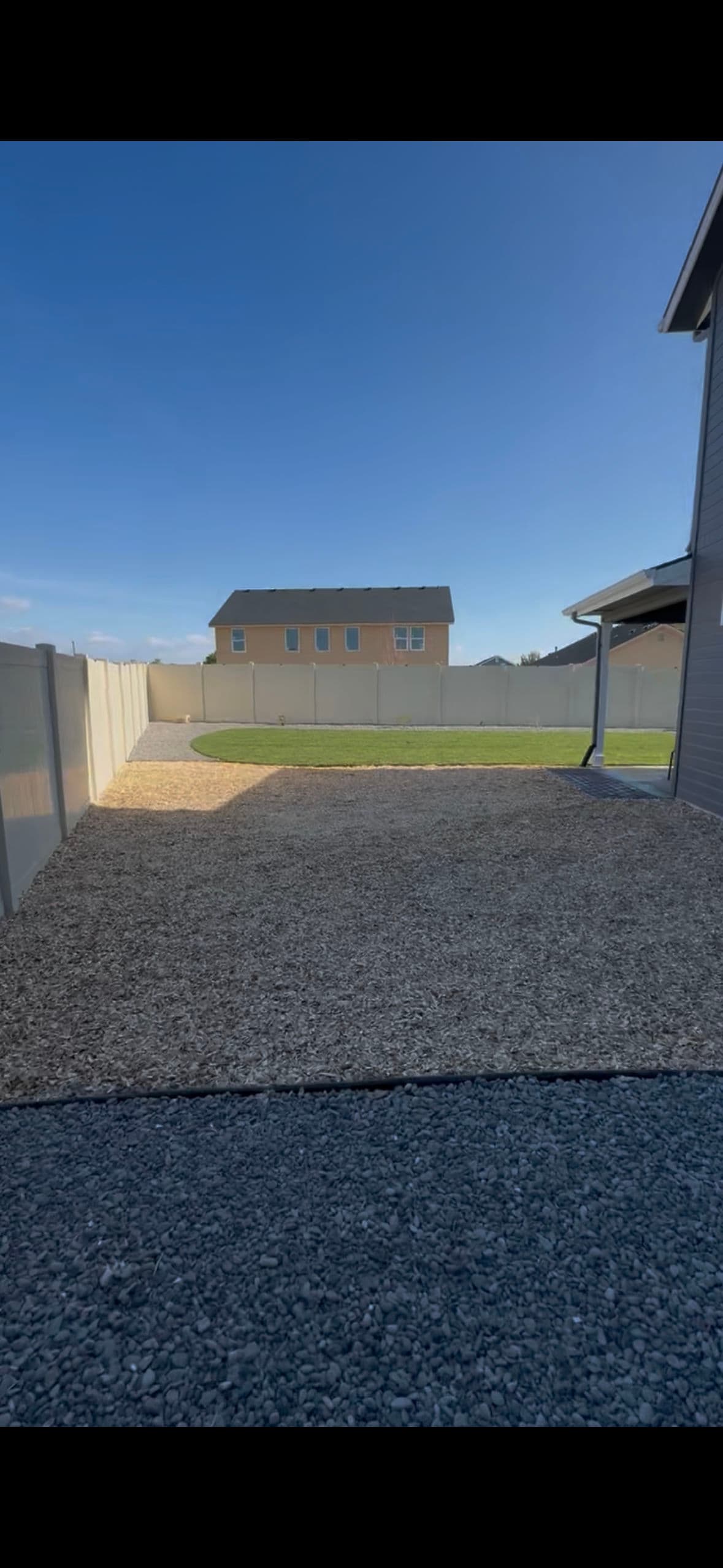Cozy Backyard Oasis with Fire Pit and Lush Lawn